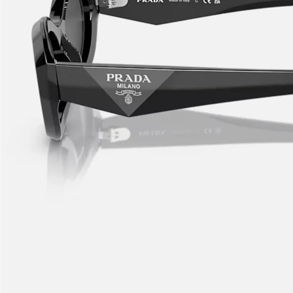 Prada Sleek Black Oval Sunglasses - Picture 2 of 4